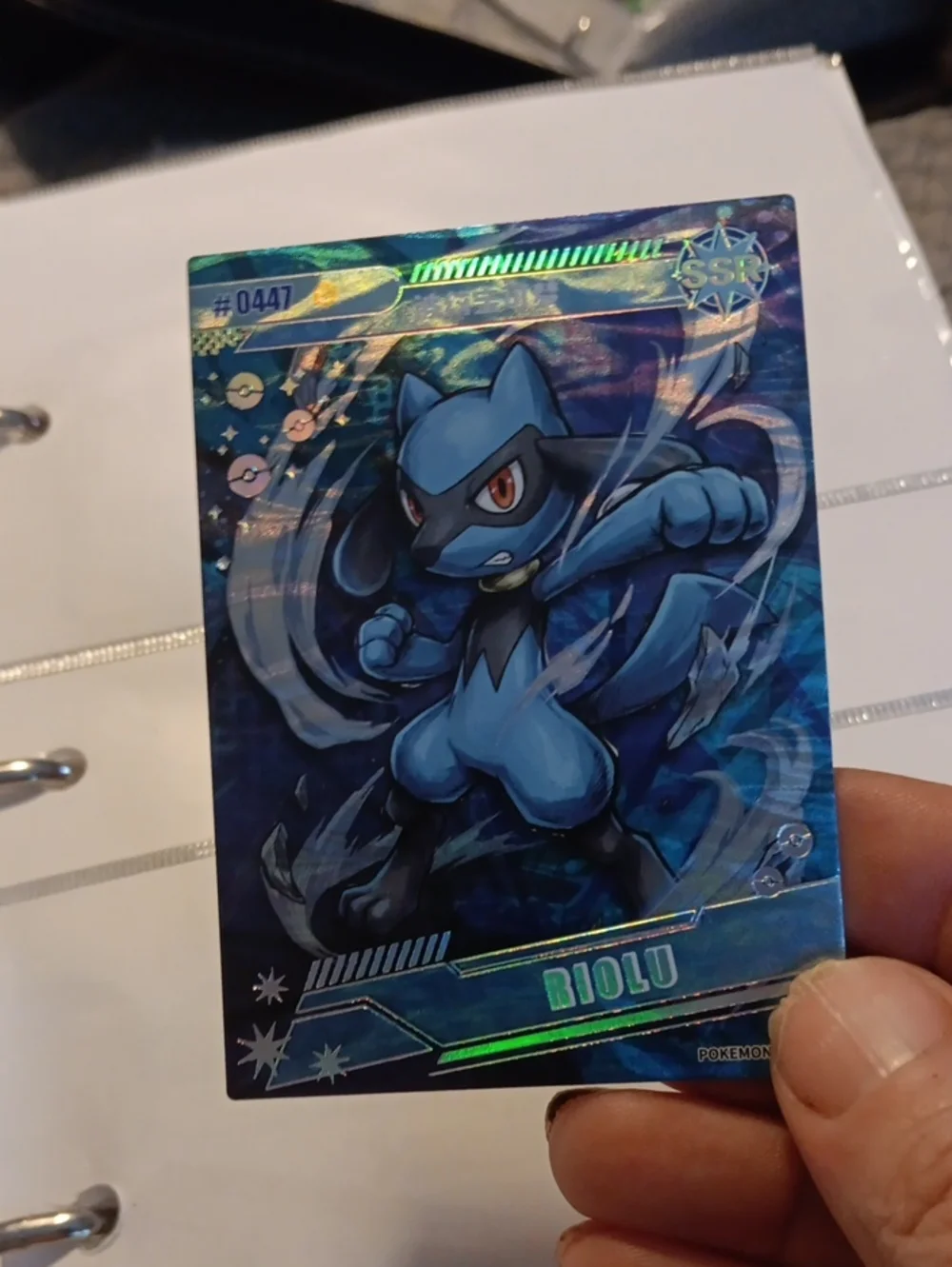 Pokemon Riolu Holographic Card – Blue